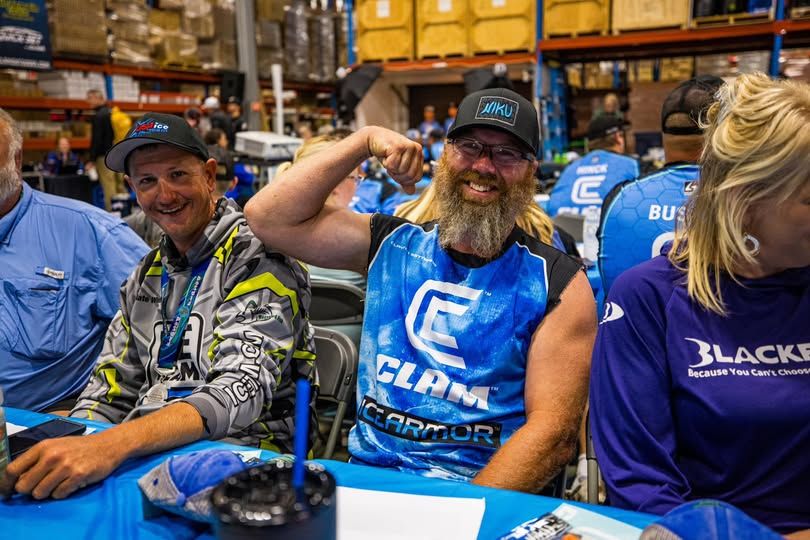 Clayton flexing at a fishing event
