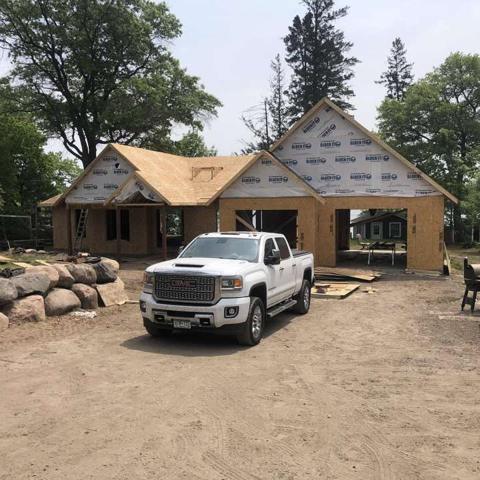 House framing at wooded site