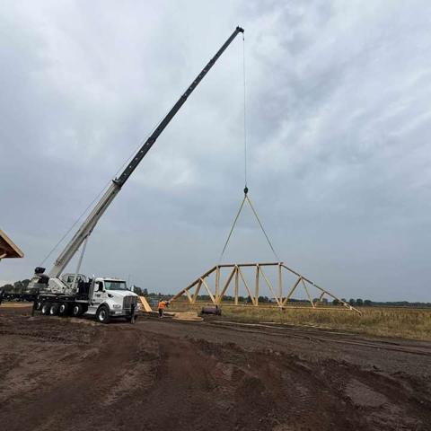 Setting roof trusses by crane